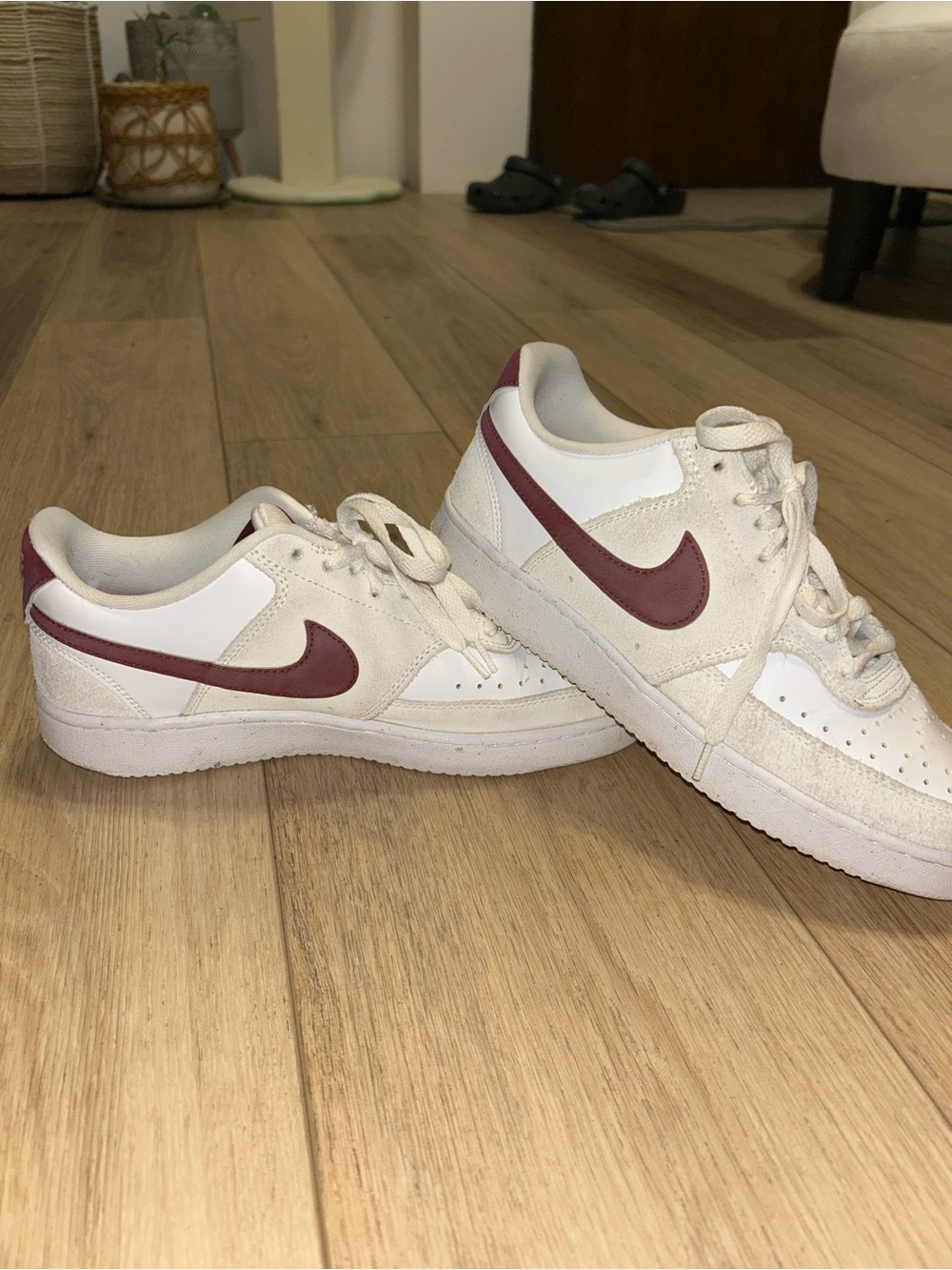 Nike White Sneakers with Maroon Swoosh Accent